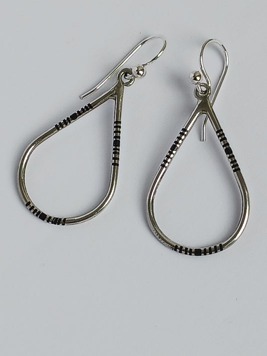 Boucles d'oreilles d'inspiration touarègue